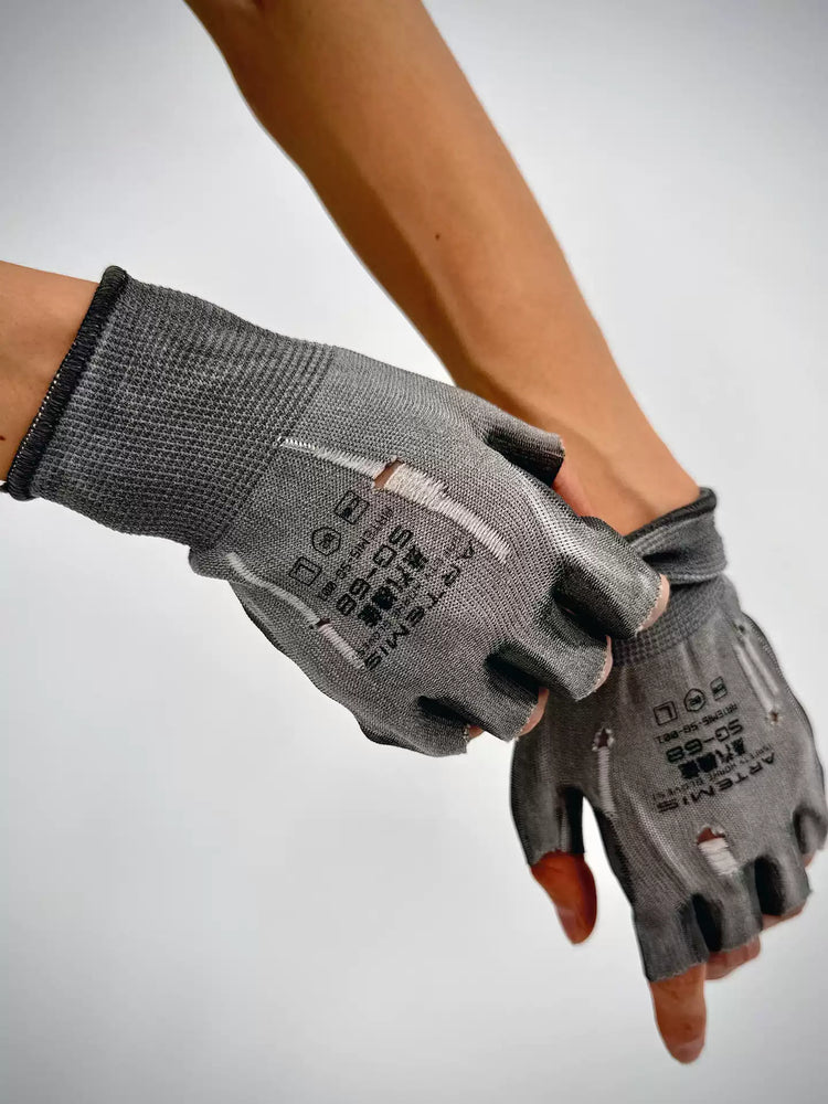 PRECISION CASTING distressed fingerless gloves in moon dust gray — crossed-hands modeled detail showing the fingerless shape and distressed cuffs