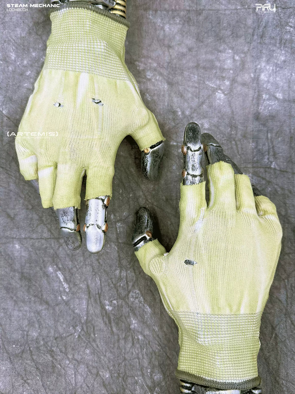 STEAM FUNCTION PRECISION CASTING distressed fingerless gloves in nebula green — overhead product view on display hands, showing uncoated distressed knit backs