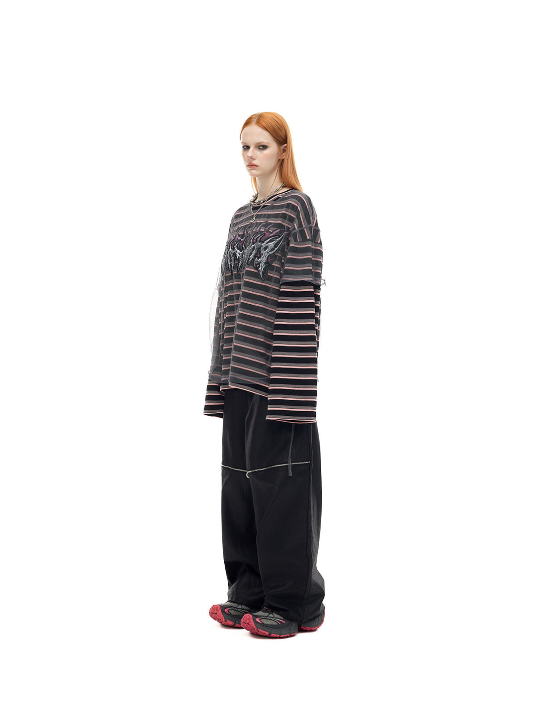PINKSPINK ELECTRIC MOON striped mesh-overlay two-piece tee in black pink — side full-length modeled view without a hat