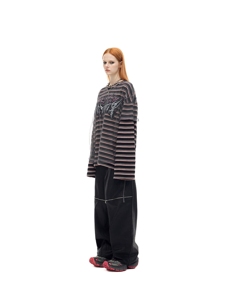 PINKSPINK ELECTRIC MOON striped mesh-overlay two-piece tee in black pink — side full-length modeled view without a hat