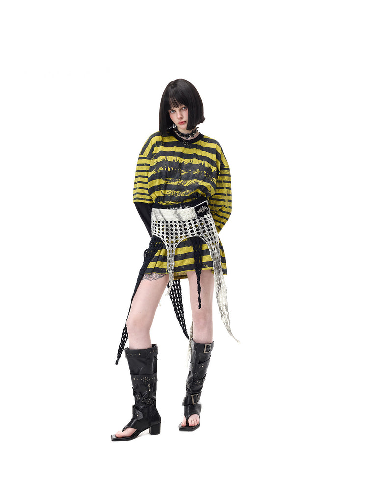 PINKSPINK THORNSTAR open-knit layering skirt in ivory white — angled front modeled view with a separate black skirt layered beneath