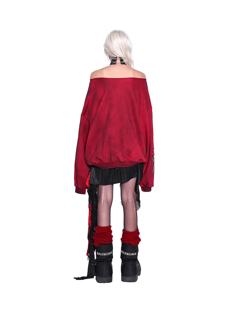 PINKSPINK ELECTRIC MOON off-shoulder sweatshirt in RED — rear full-body view styled with a black skirt.