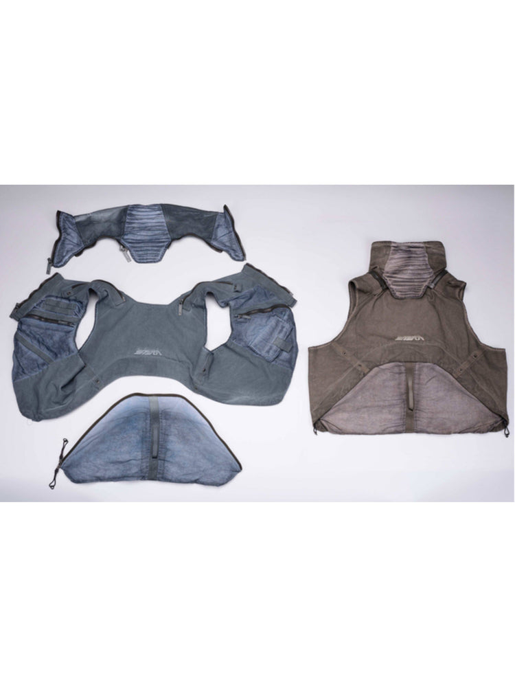 FISSION modular vest — back flat-lay comparison of star blue detached panels and the assembled mercury brown vest