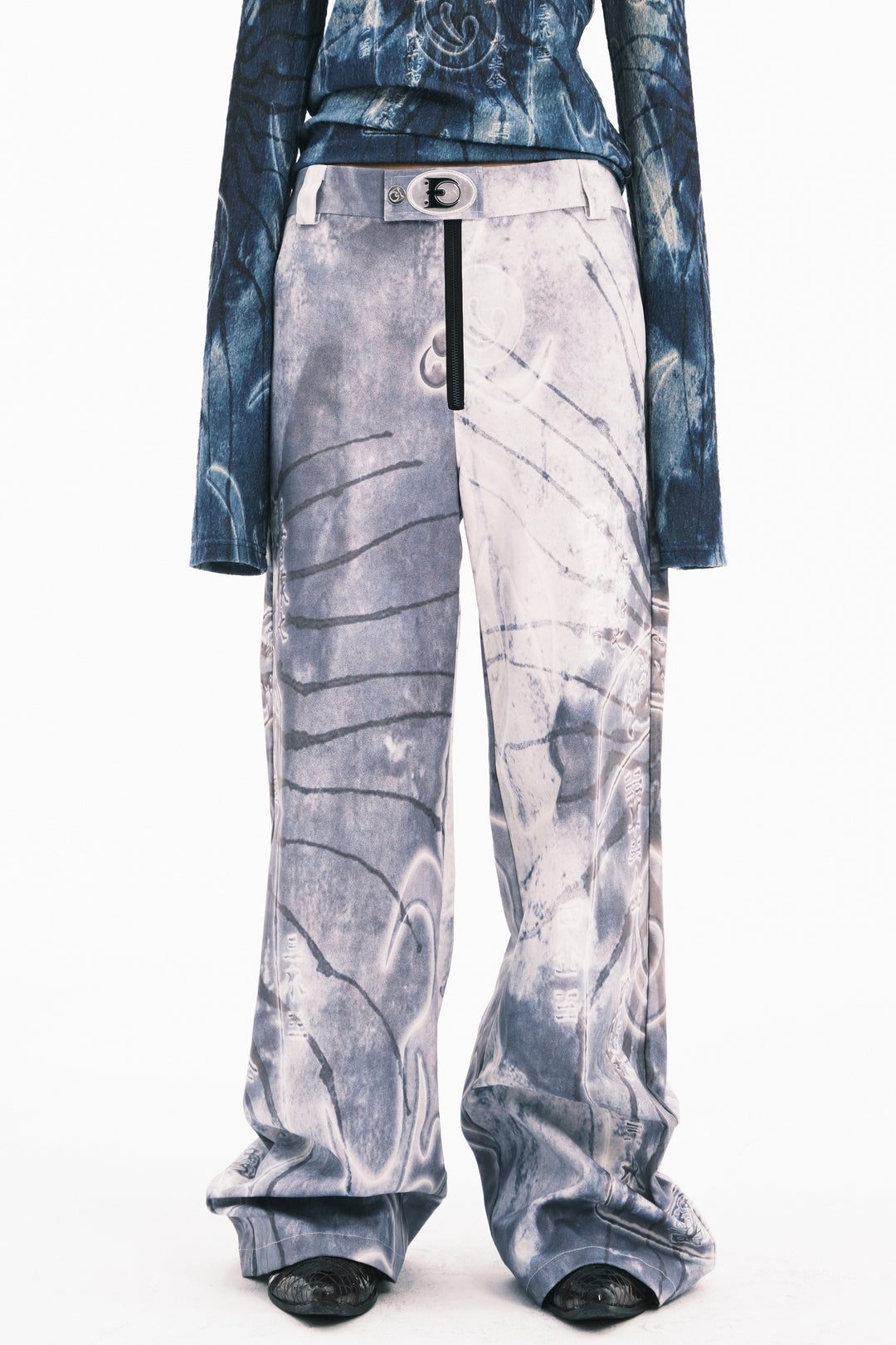 EMBRYO ANCIENT CODE coated wide-leg pants — fabric and graphic detail