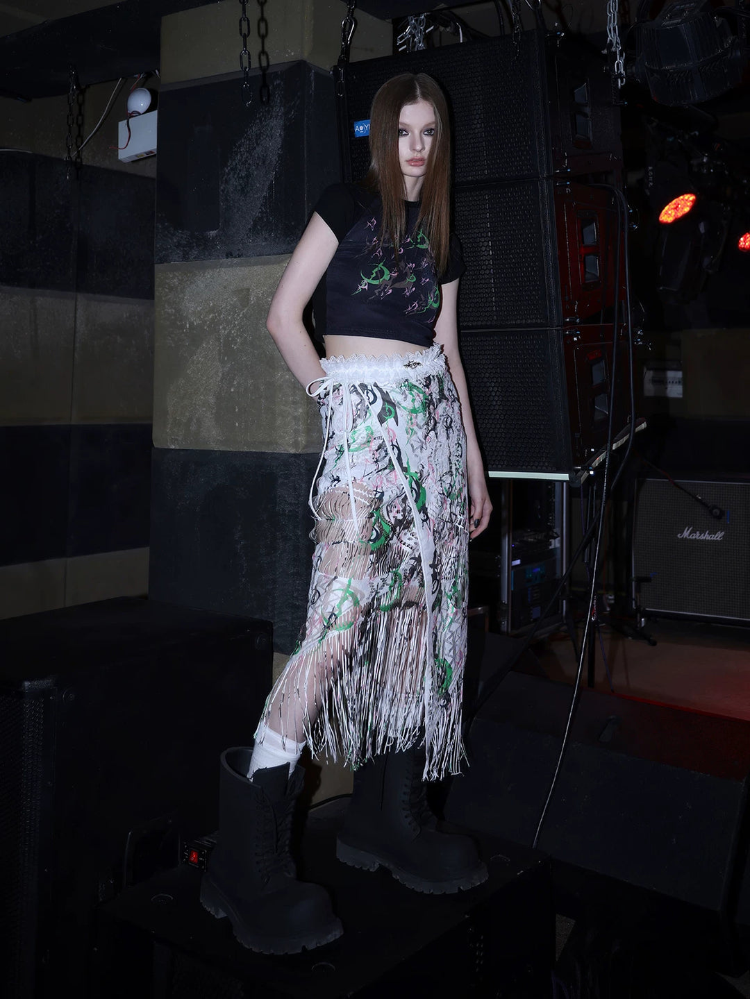 PINKSPINK SHRED SIGNAL printed fringe layering apron — white multicolor — angled modeled view of the printed fringe