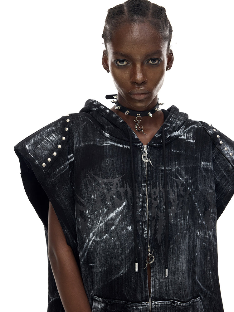 PINKSPINK ELECTRIC MOON studded cat-ear vest in black — front close-up showing the chest graphic, coated finish and studded shoulder panels