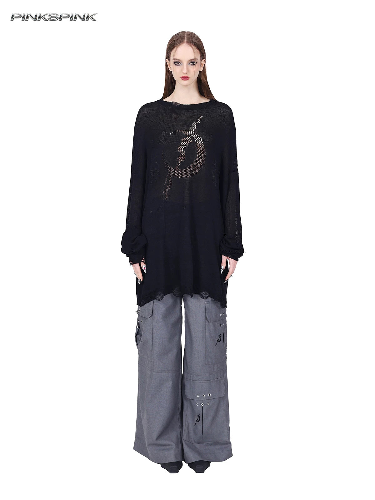 PINKSPINK ELECTRIC MOON distressed open-knit sweater in black — full-length loose front view styled with gray trousers