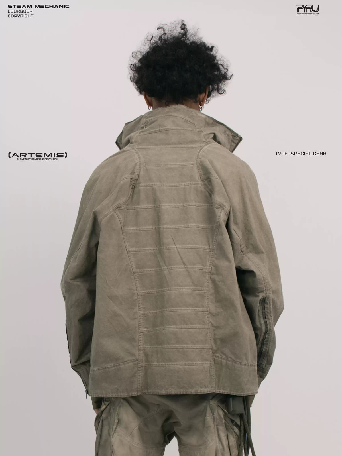 ARTEMIS xirang brown tuck-paneled technical jacket — close modeled back view showing the horizontal tuck panels