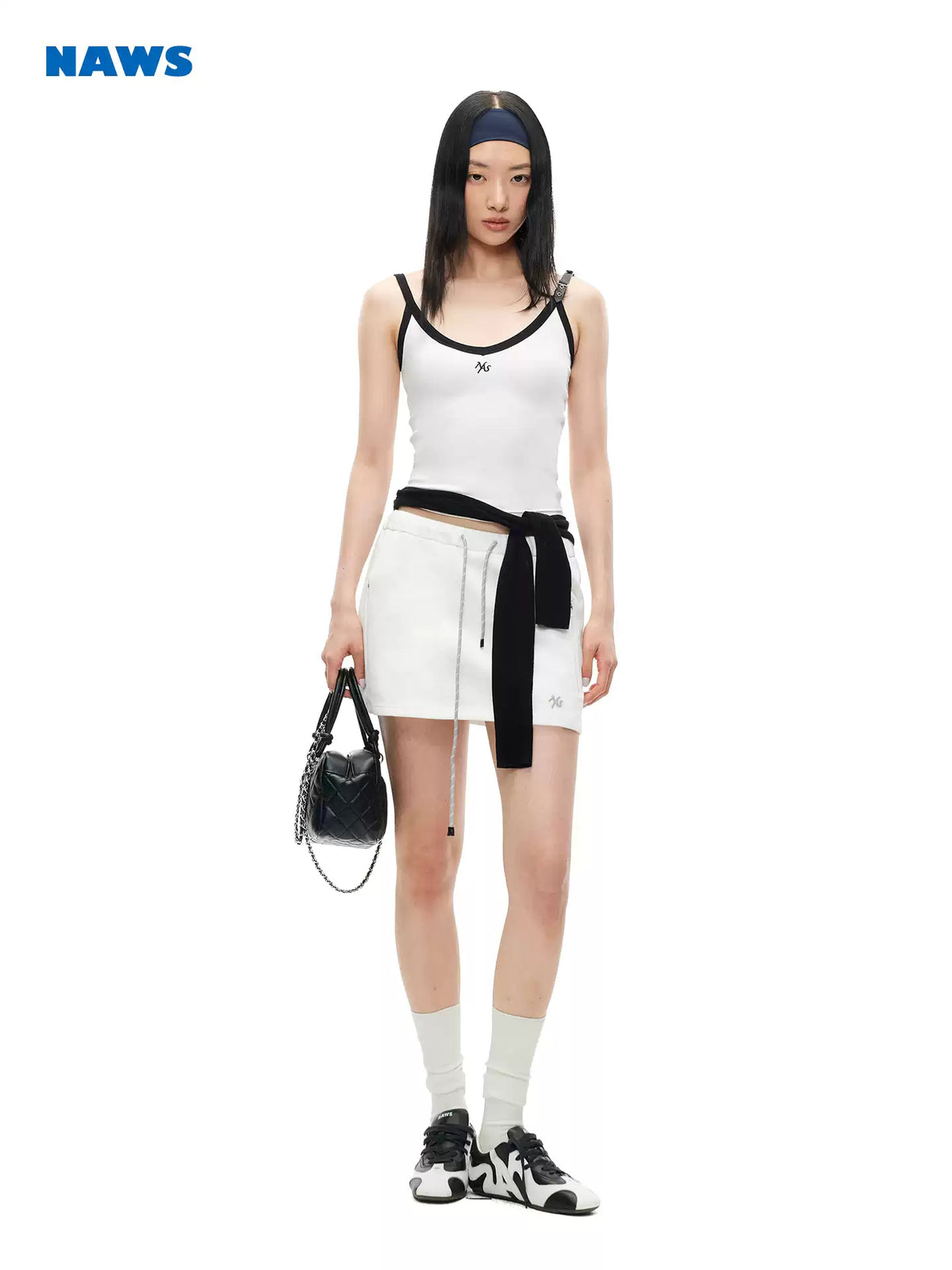 NAWS MONA leather-belt camisole — close modeled view highlighting the construction