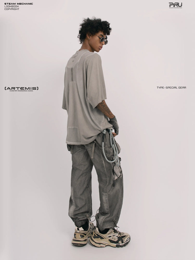 STARFIELD WELDER lunar sea gray distressed mesh tee — rear three-quarter view looking over the shoulder