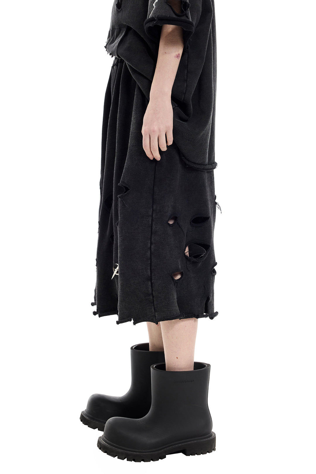 PINKSPINK ELECTRIC MOON distressed embroidered wide-leg shorts — black — side detail of the distressed openings and raw hem
