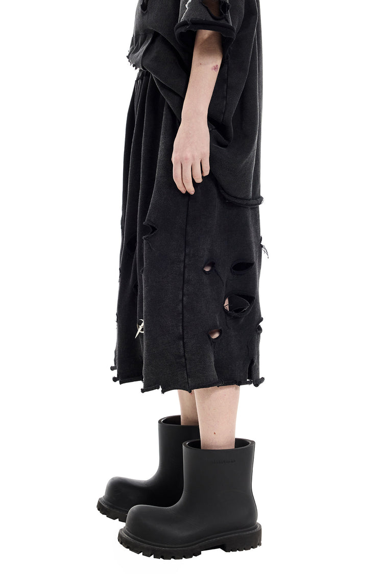 PINKSPINK ELECTRIC MOON distressed embroidered wide-leg shorts — black — side detail of the distressed openings and raw hem