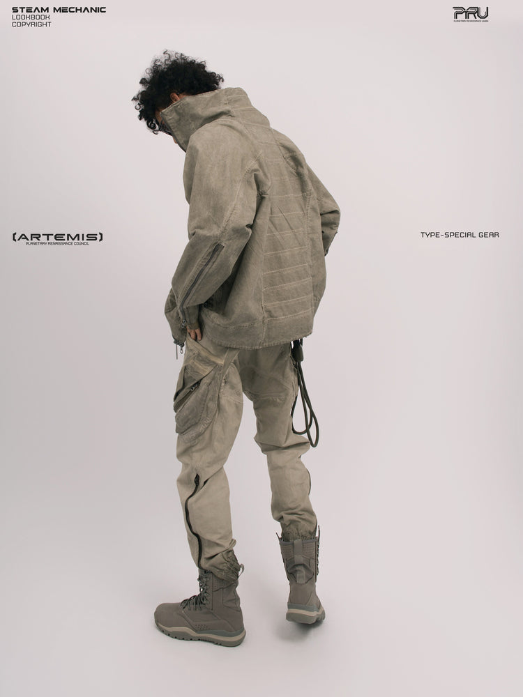 ARTEMIS tuck-paneled technical jacket — rear three-quarter modeled view showing tucked back panels