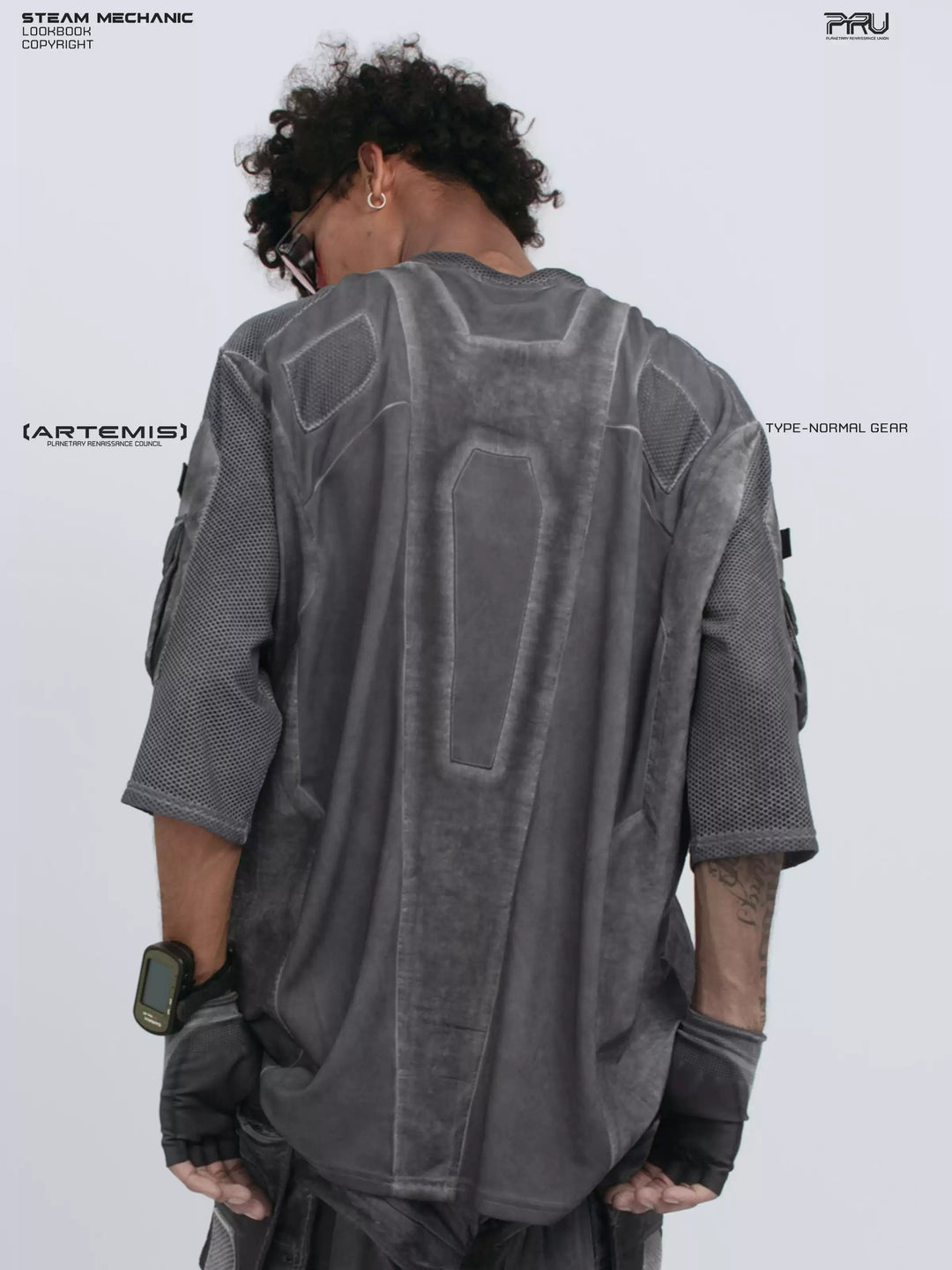 STARCORE moon dust gray velcro mesh tee — rear three-quarter modeled view showing geometric panels