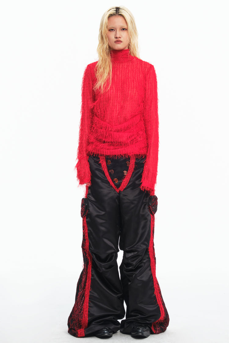 EMBRYO IMPACT SHIELD padded wide-leg pants — close modeled view