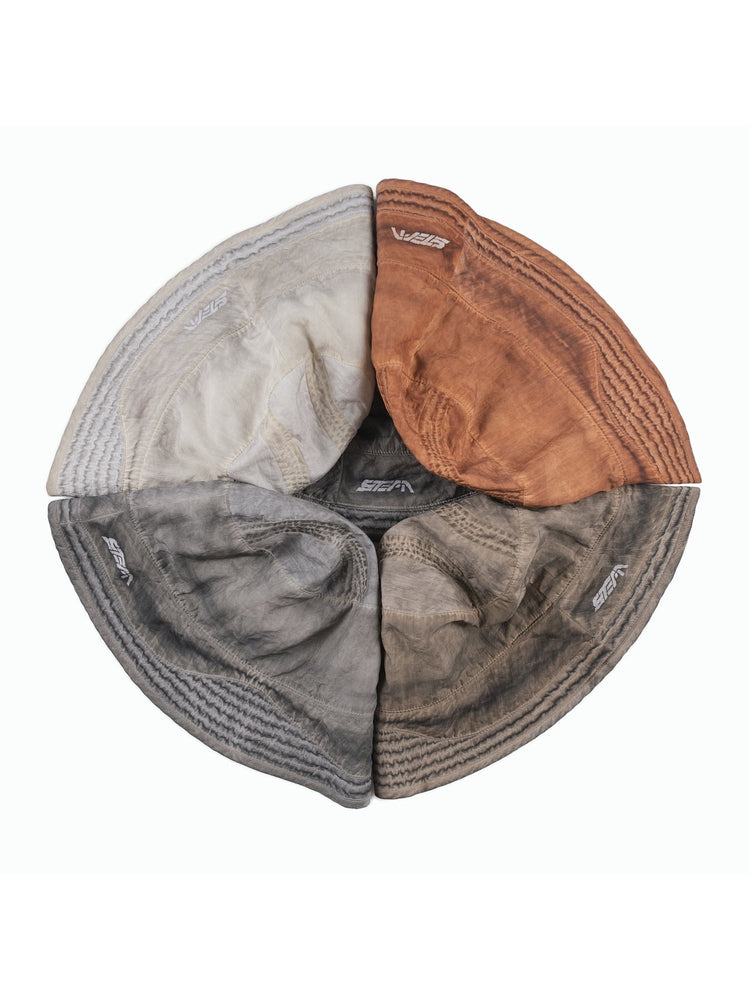 PIONEER distressed nylon bucket hat — garment-only comparison of the four original colorways