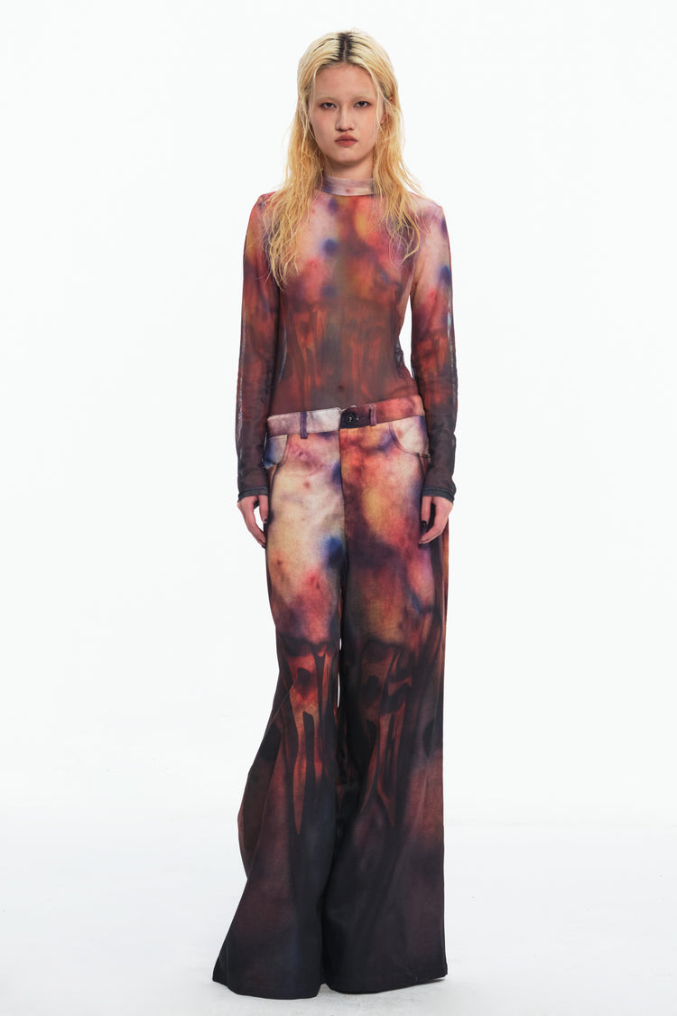EMBRYO BRUISE SIGNAL printed wide-leg pants — rear modeled view