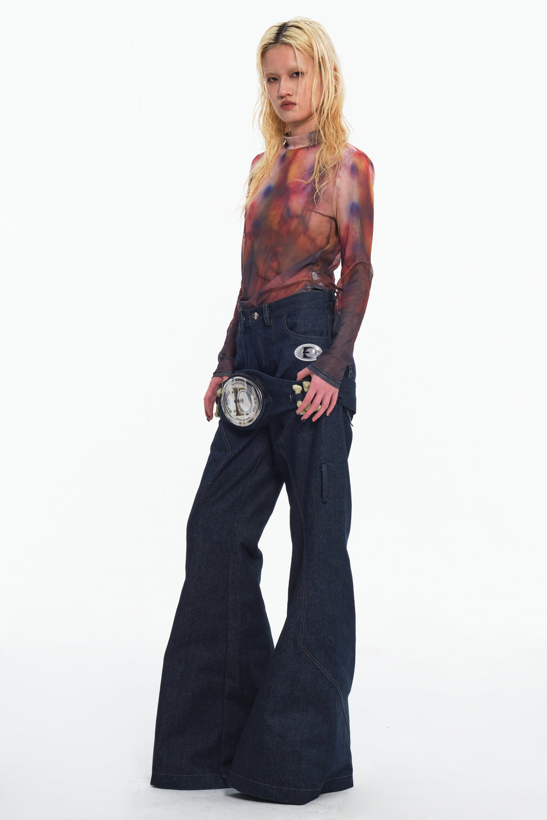 EMBRYO BONE FRAME low-rise flare pants & waist panel — construction detail