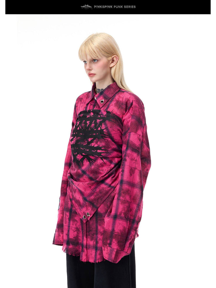 PINKSPINK ELECTRIC MOON distressed oversized plaid shirt in pink and black plaid — close angled modeled view styled with a matching scarf