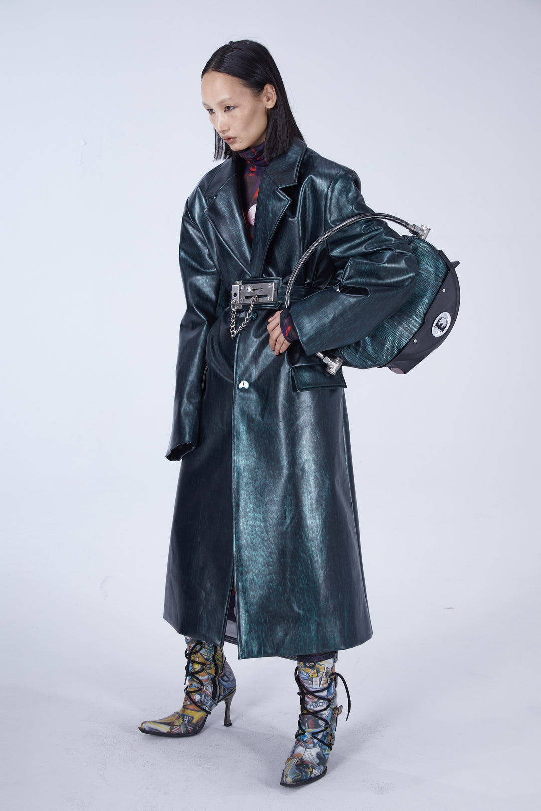 EMBRYO MATRIX buckle PU leather trench coat — material and hardware detail