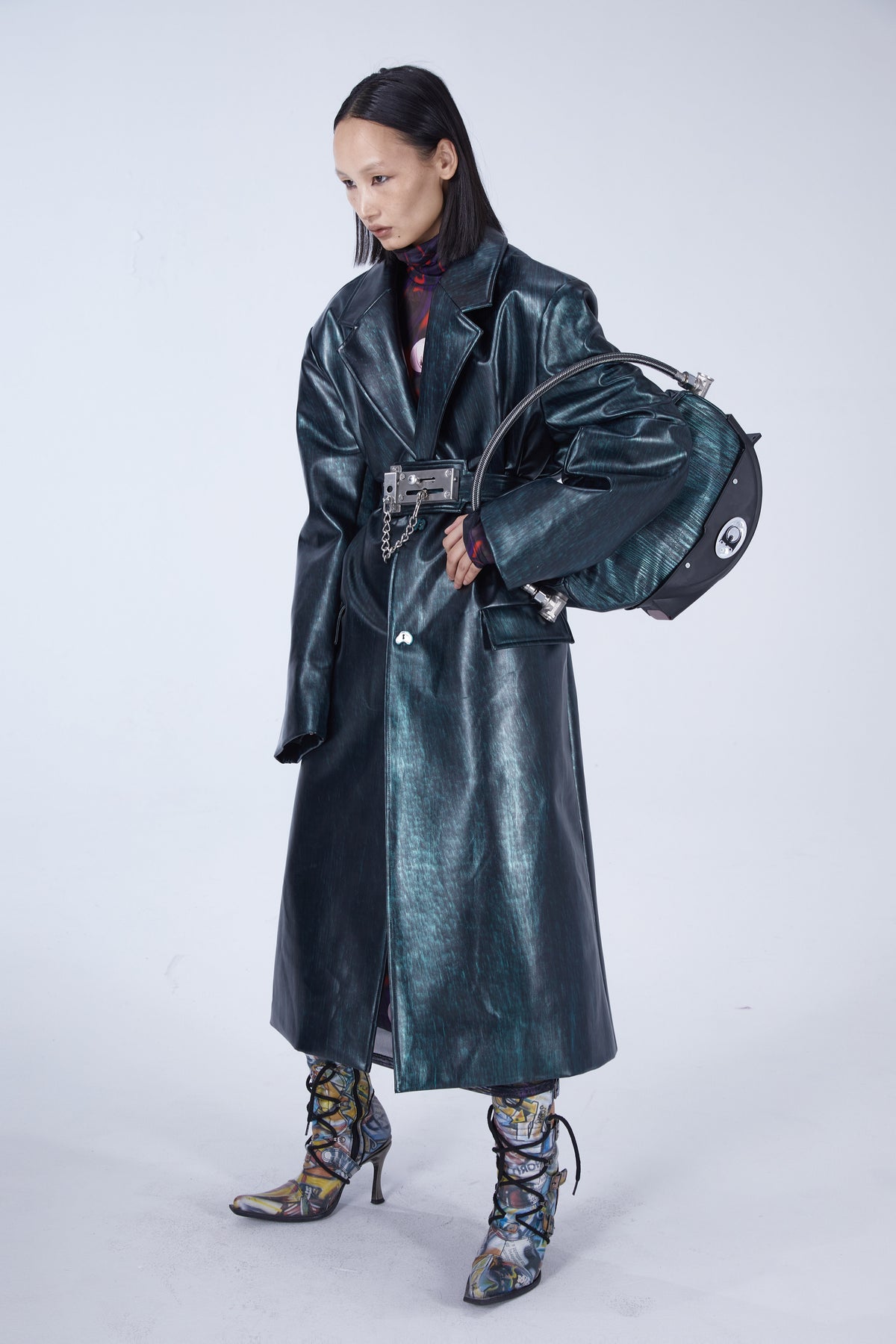 EMBRYO MATRIX buckle PU leather trench coat — material and hardware detail