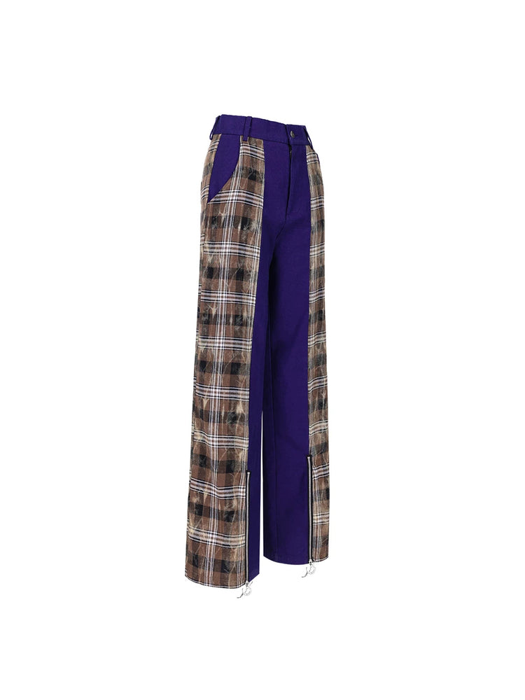 PINKSPINK DNA purple plaid split-panel wide-leg pants — front garment-only view showing the contrast panels and zip hems