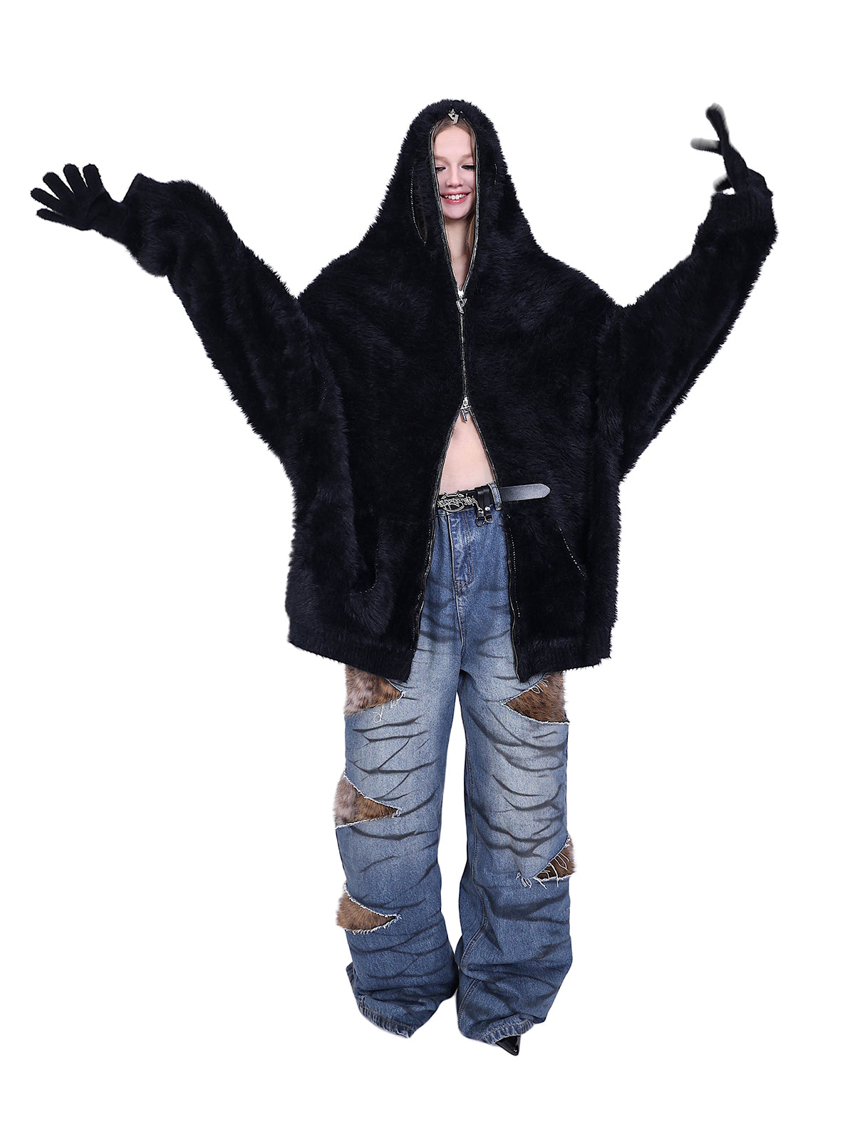 PINKSPINK SCRATCH leopard-panel layered jeans — modeled front view with arms raised, showing the waistband and wide denim legs