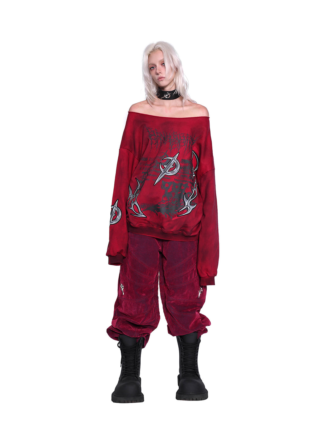 PINKSPINK ELECTRIC MOON off-shoulder sweatshirt in RED — full-body front view styled with red trousers.