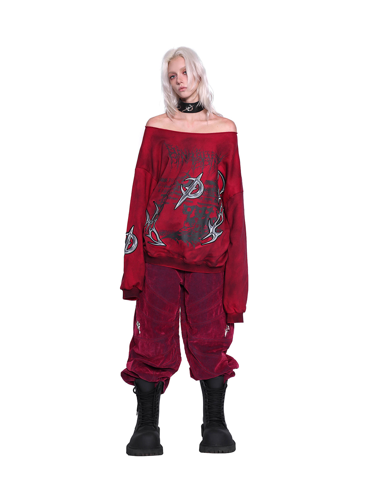PINKSPINK ELECTRIC MOON off-shoulder sweatshirt in RED — full-body front view styled with red trousers.
