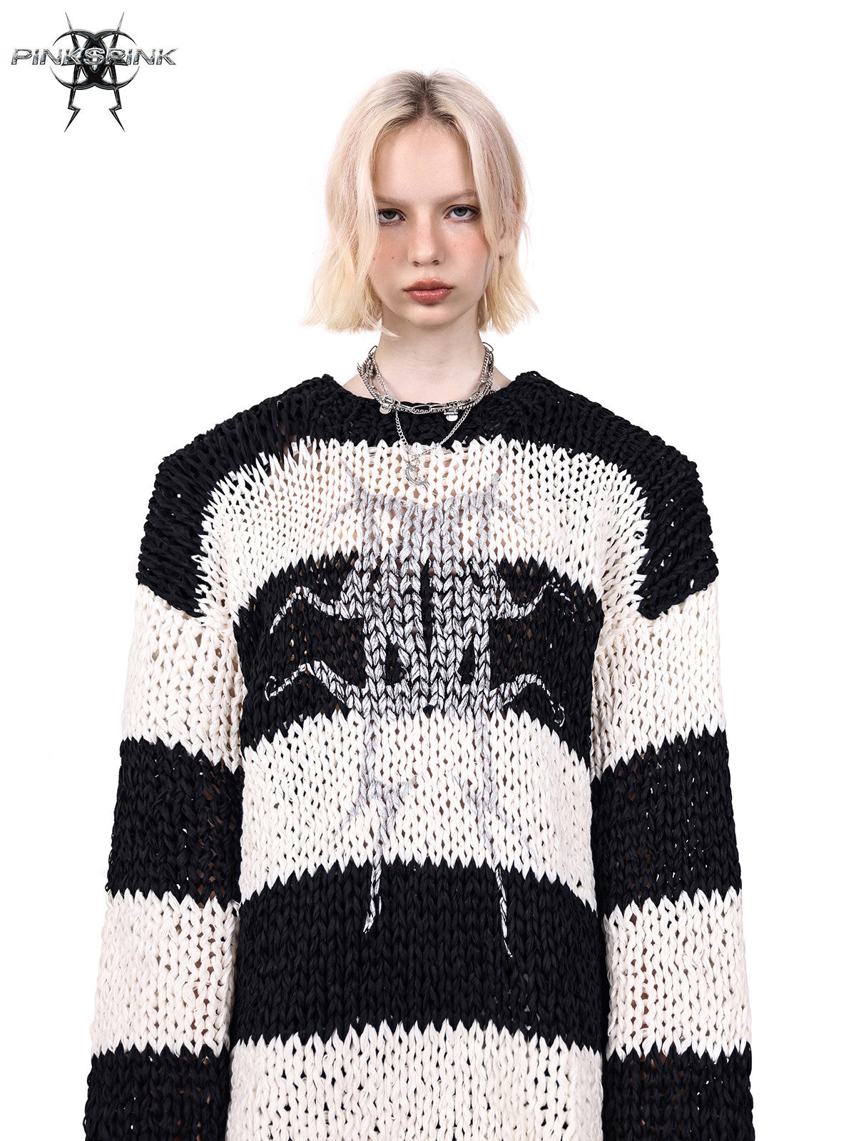 PINKSPINK MIRROR striped open-knit padded-shoulder sweater in black white stripes — front modeled detail showing the open knit and metallic moon motif