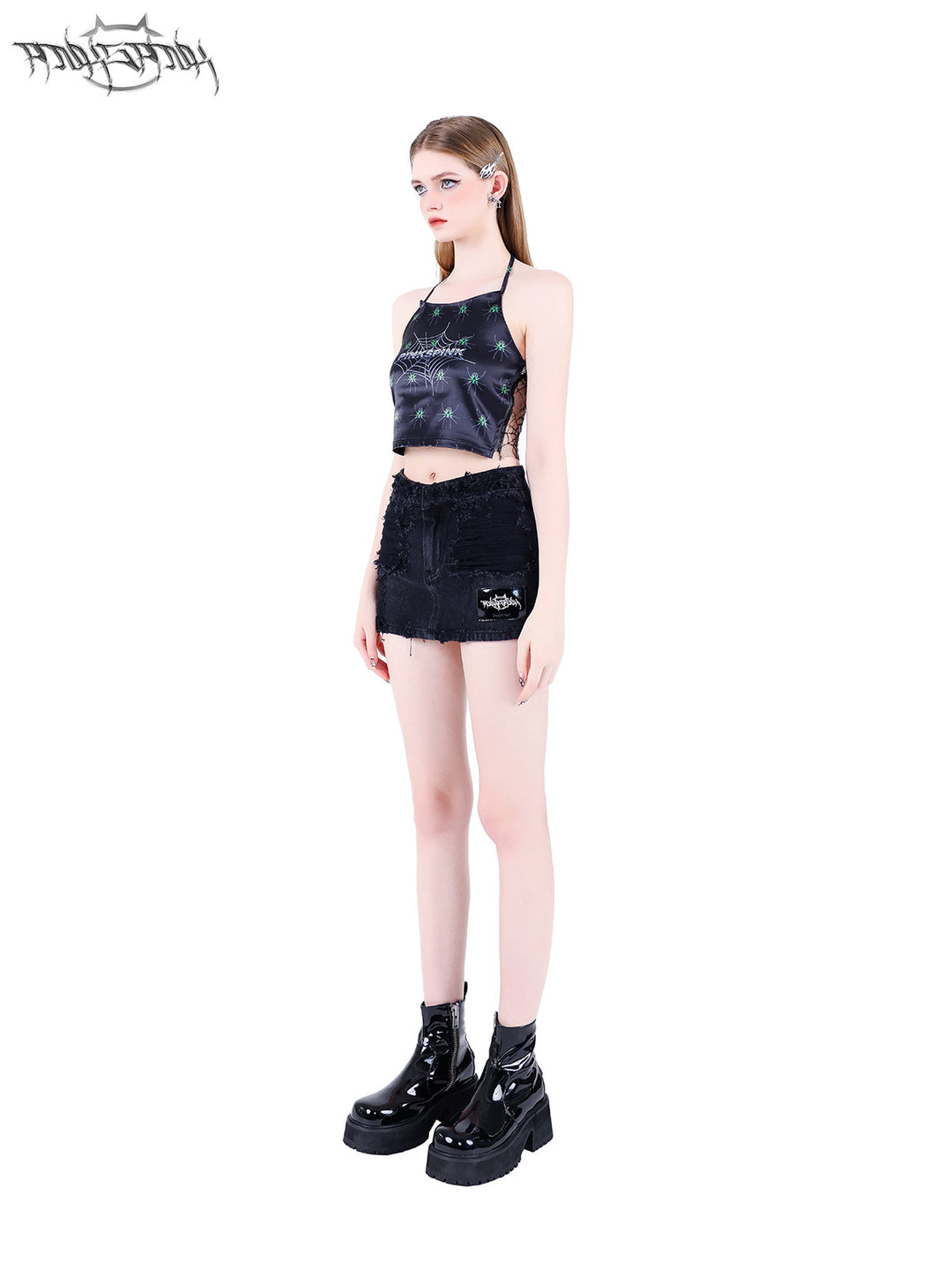 PINKSPINK SPIDER web-mesh halter crop top — front full-length modeled view styled with a mini skirt