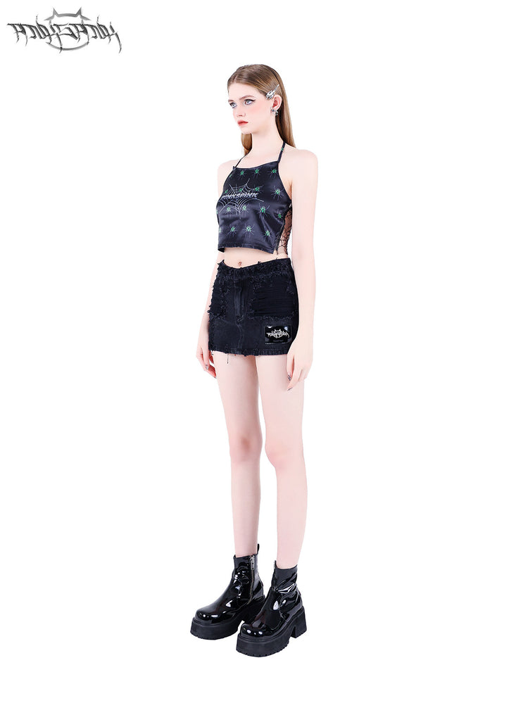 PINKSPINK SPIDER web-mesh halter crop top — front full-length modeled view styled with a mini skirt