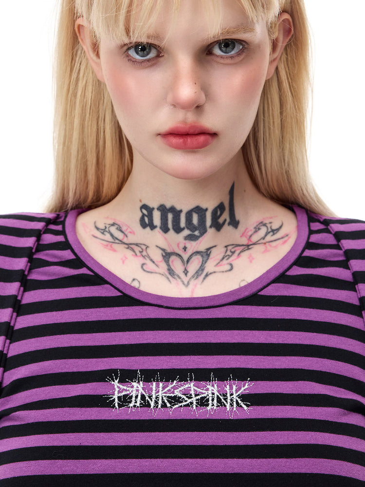 PINKSPINK GHOSTHAND striped glove-sleeve tee in purple and black — close-up of the rounded neckline, striped cotton fabric and embroidered chest logo