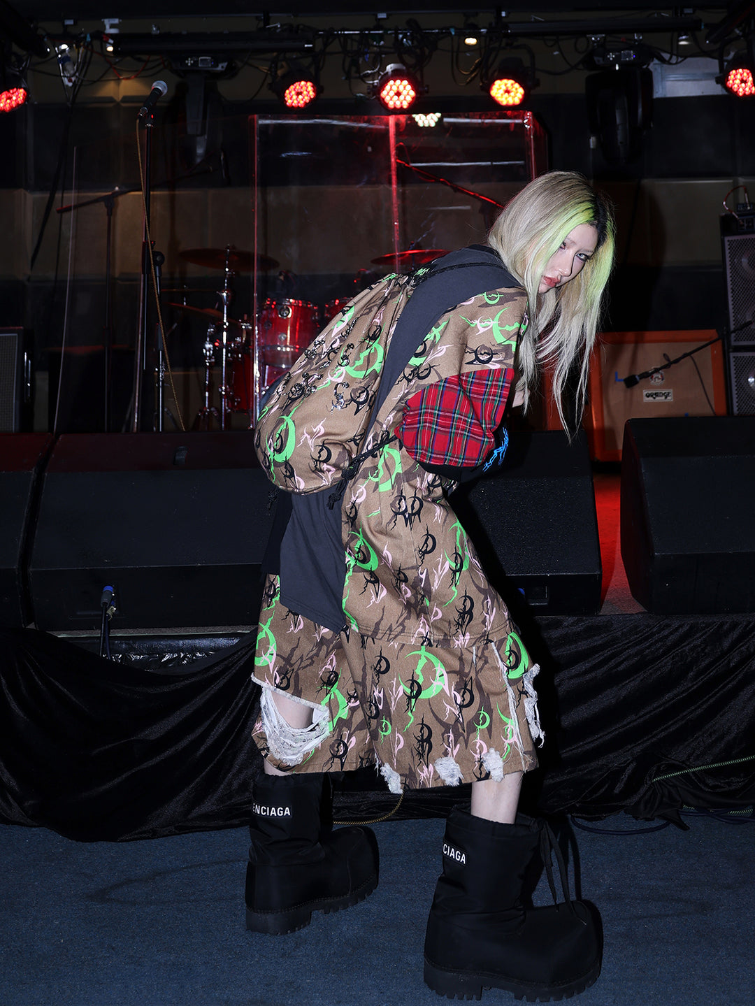 PINKSPINK ELECTRIC MOON distressed camo cropped trousers in CAMOUFLAGE — rear three-quarter with coordinating bag.