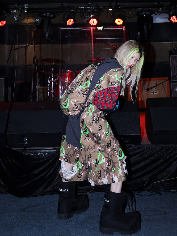 PINKSPINK ELECTRIC MOON distressed camo cropped trousers in CAMOUFLAGE — rear three-quarter with coordinating bag.