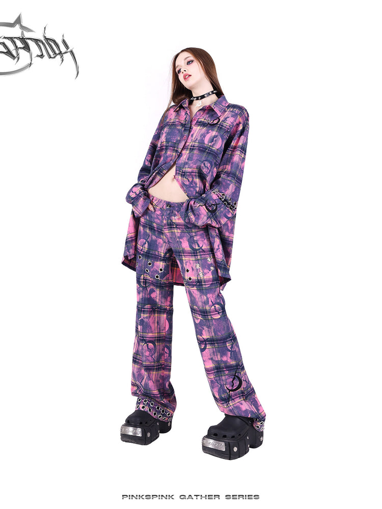 PINKSPINK ELECTRIC MOON wasteland plaid straight-leg pants — close modeled view highlighting the construction