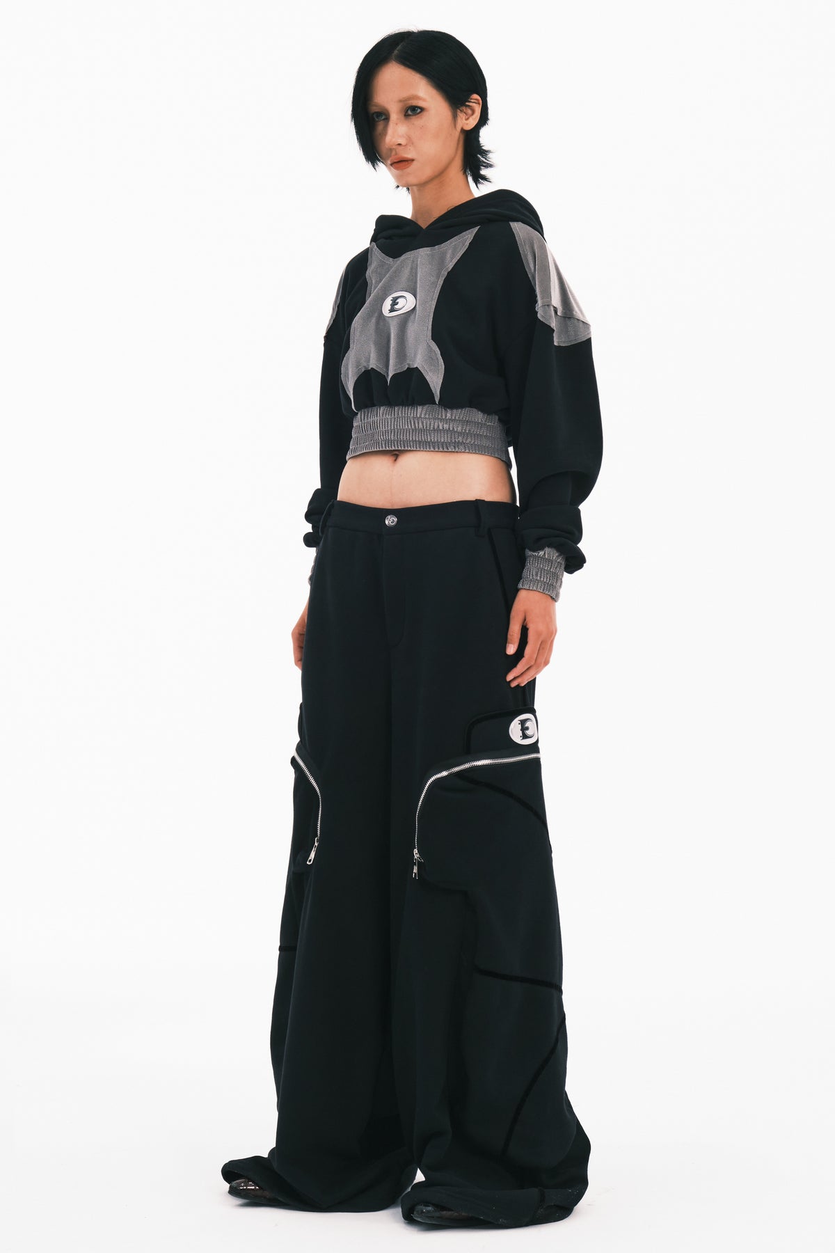 EMBRYO BIG POCKET wide-leg sweatpants in black — full-length three-quarter modeled view styled with the GUARD CORE cropped sweatshirt