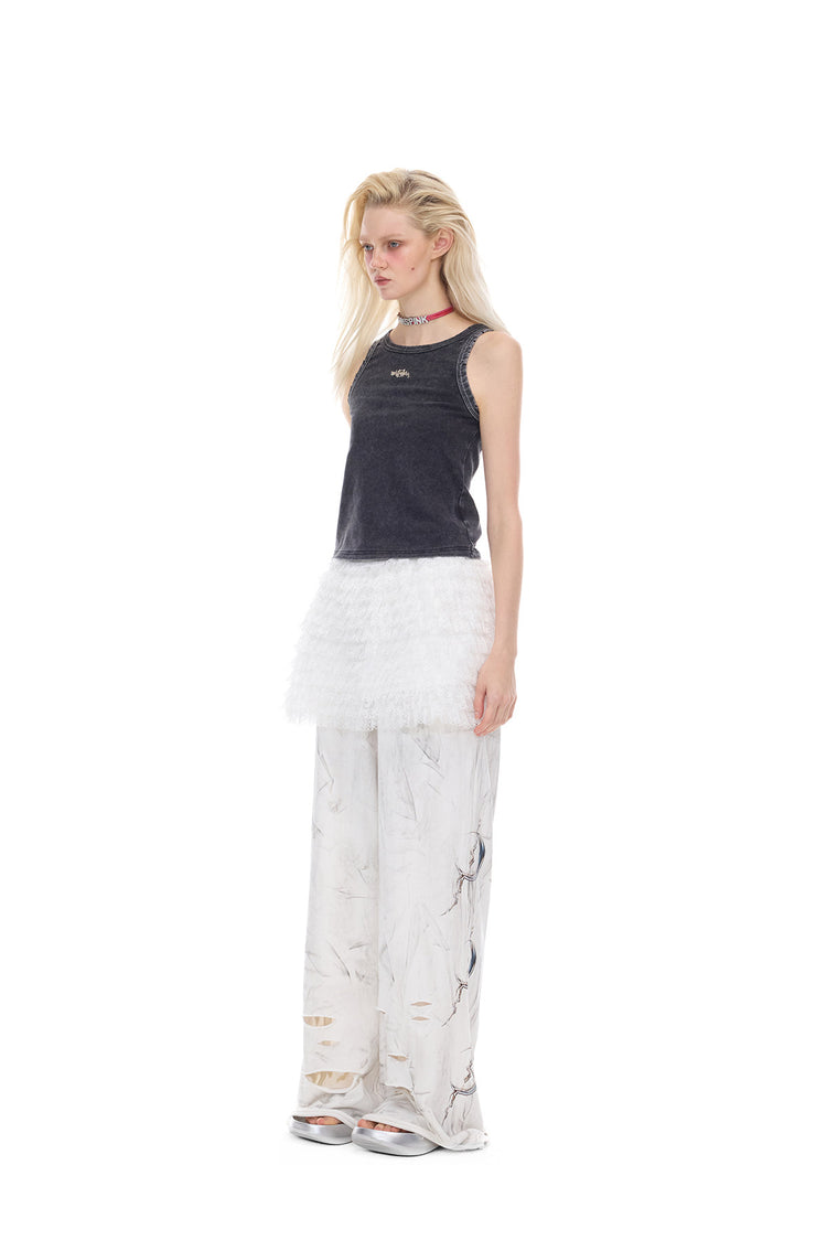 PINKSPINK ELECTRIC MOON coated distressed flare sweatpants — modeled front styling view