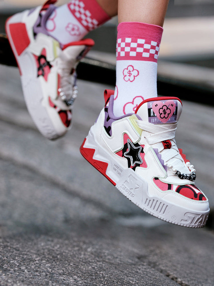 STARTER RICHFLOWER Fortune Red platform sneakers worn with patterned socks, close-up showing beaded laces and star panels