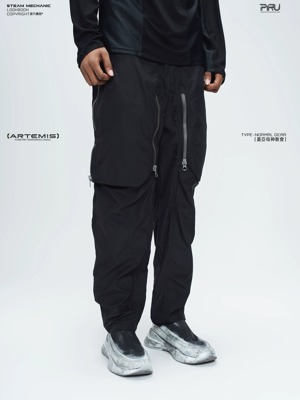 GAIA stone green curved-blade technical pants — alternate modeled angle