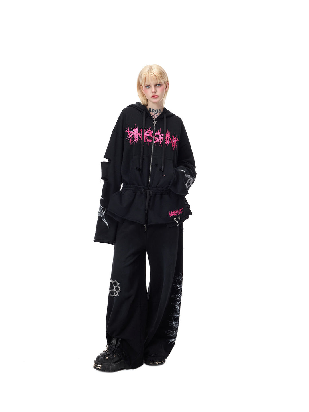 PINKSPINK MOHAWK RITUAL studded zip-up hoodie — front full-length styling with hands in pockets