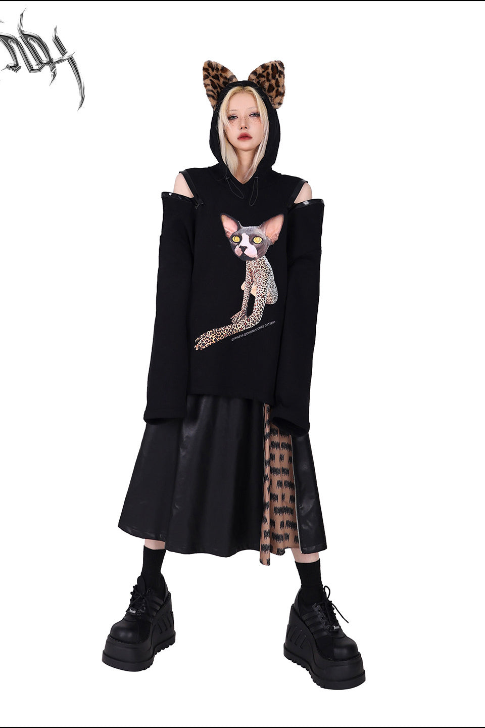 PINKSPINK EXHIBITION CORE zip A-line midi skirt — modeled detail view of the garment construction