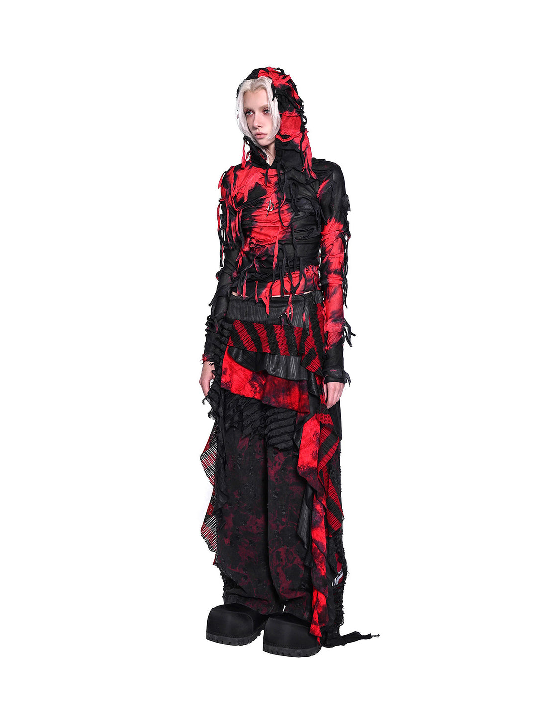 PINKSPINK ELECTRIC MOON layered striped mesh mini skirt — black and red — full-length front view layered over patterned trousers