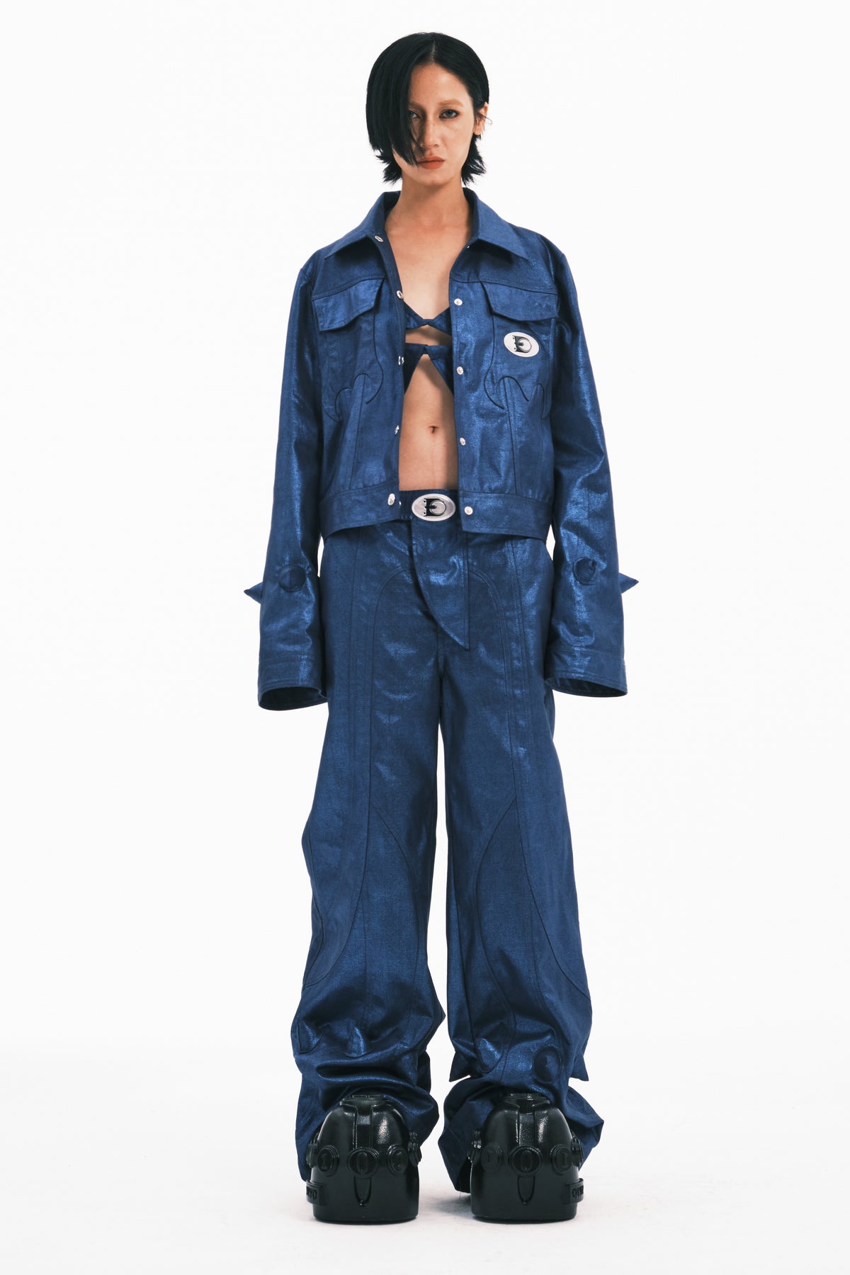 EMBRYO BLUE SPIKE metallic flare pants — blue front full-length outfit with matching jacket and platform footwear
