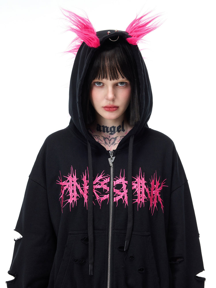 PINKSPINK MOHAWK RITUAL studded zip-up hoodie — front modeled view with mohawk hood raised