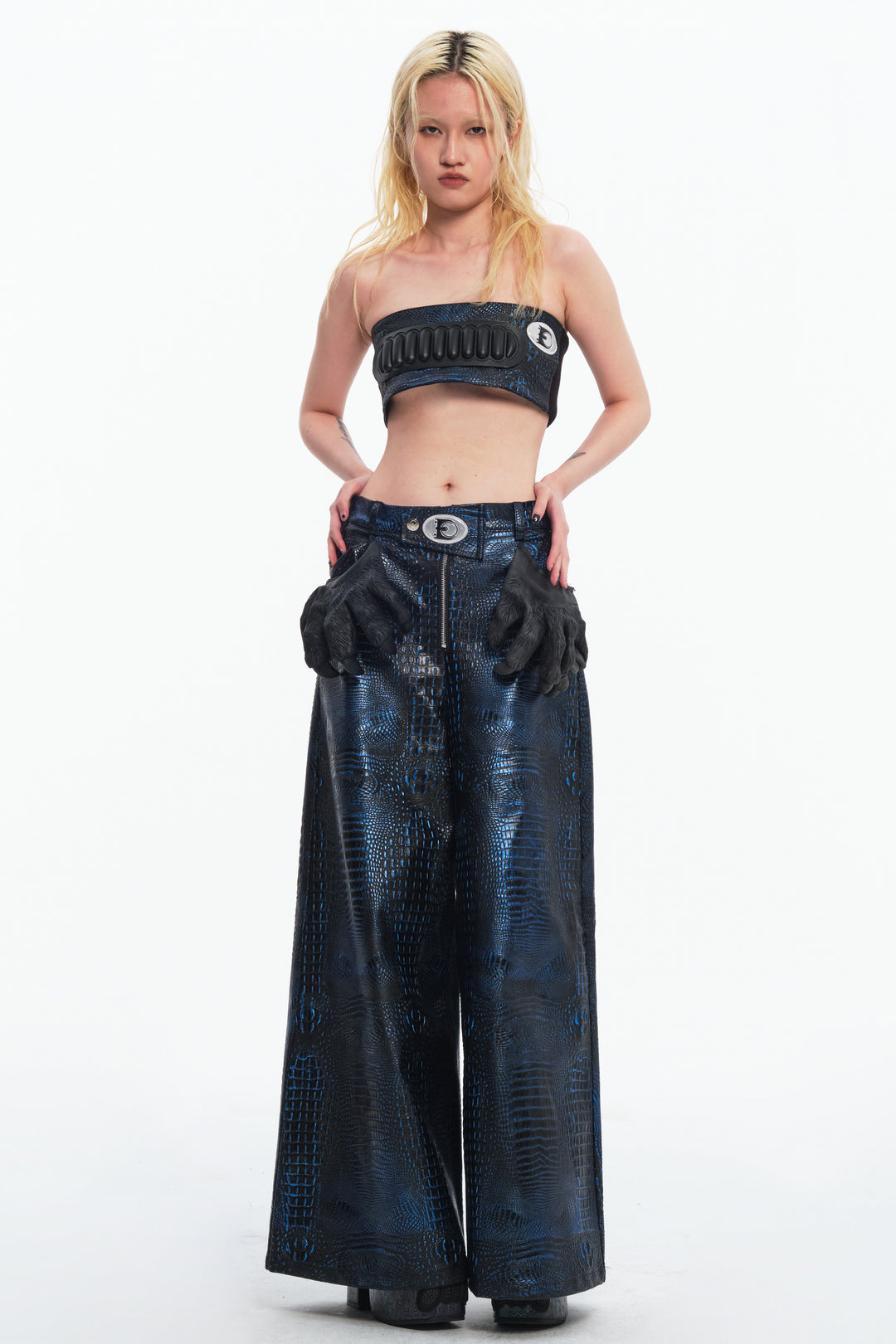 EMBRYO CLAW ARMOR crocodile-effect wide-leg pants — full-length modeled styling view