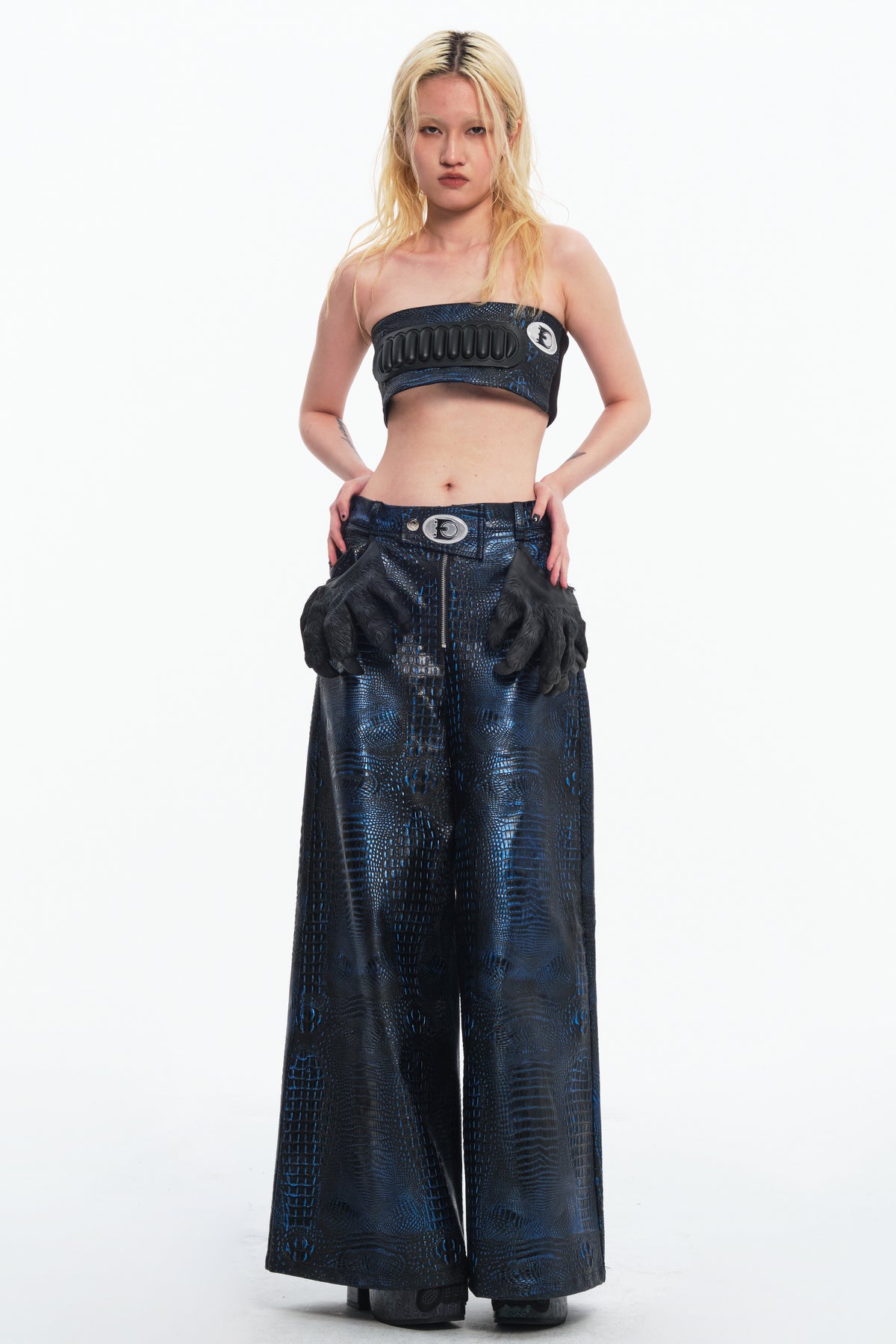 EMBRYO CLAW ARMOR crocodile-effect wide-leg pants — full-length modeled styling view