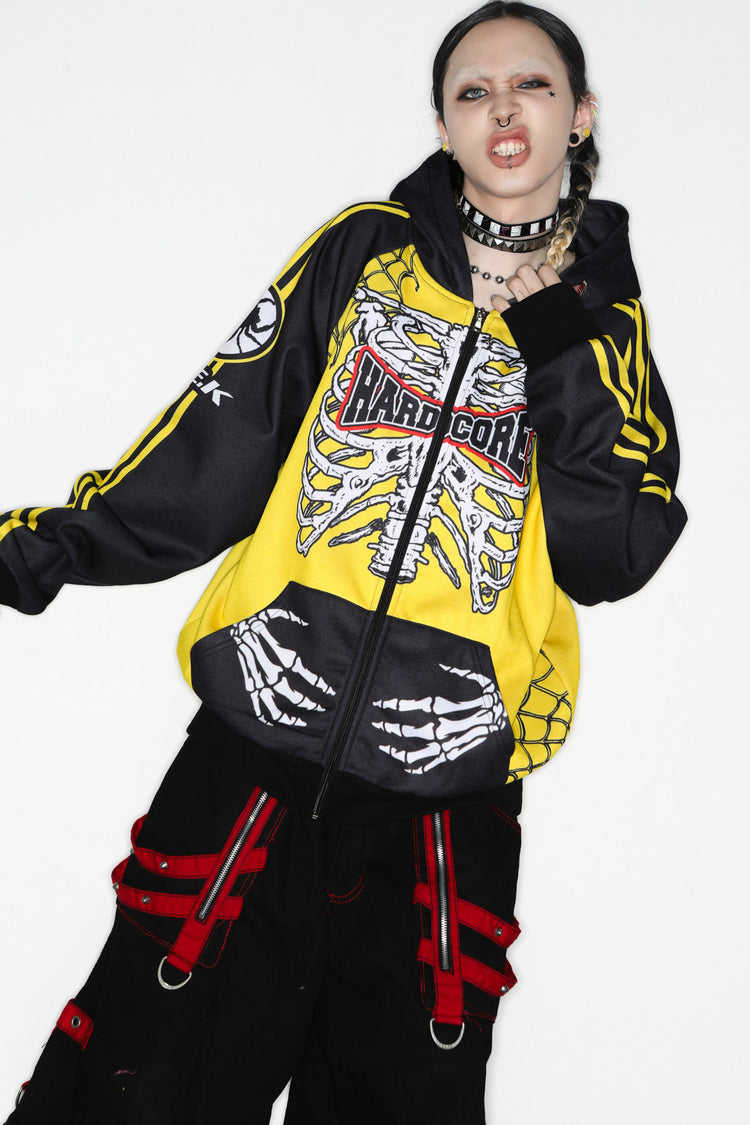 DeadEndKids Hardcore Generation skeleton zip-up hoodie — modeled front, arm-out pose