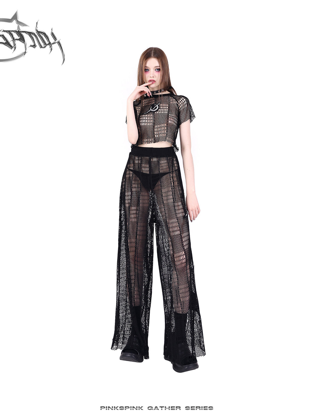 PINKSPINK GEOMETRY open-mesh crop tee in black — full-length modeled view styled with sheer mesh pants