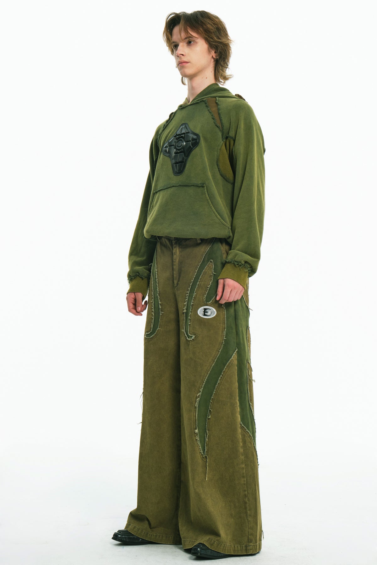 EMBRYO GREEN GUARD distressed wide-leg pants — rear modeled view